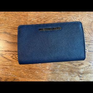 Michael Kors Jet Set Travel Slim Bifold Wallet with Snap Closure Button